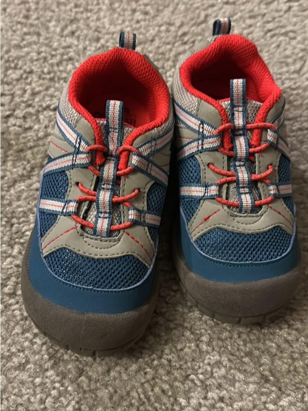 Osh Kosh sneakers.